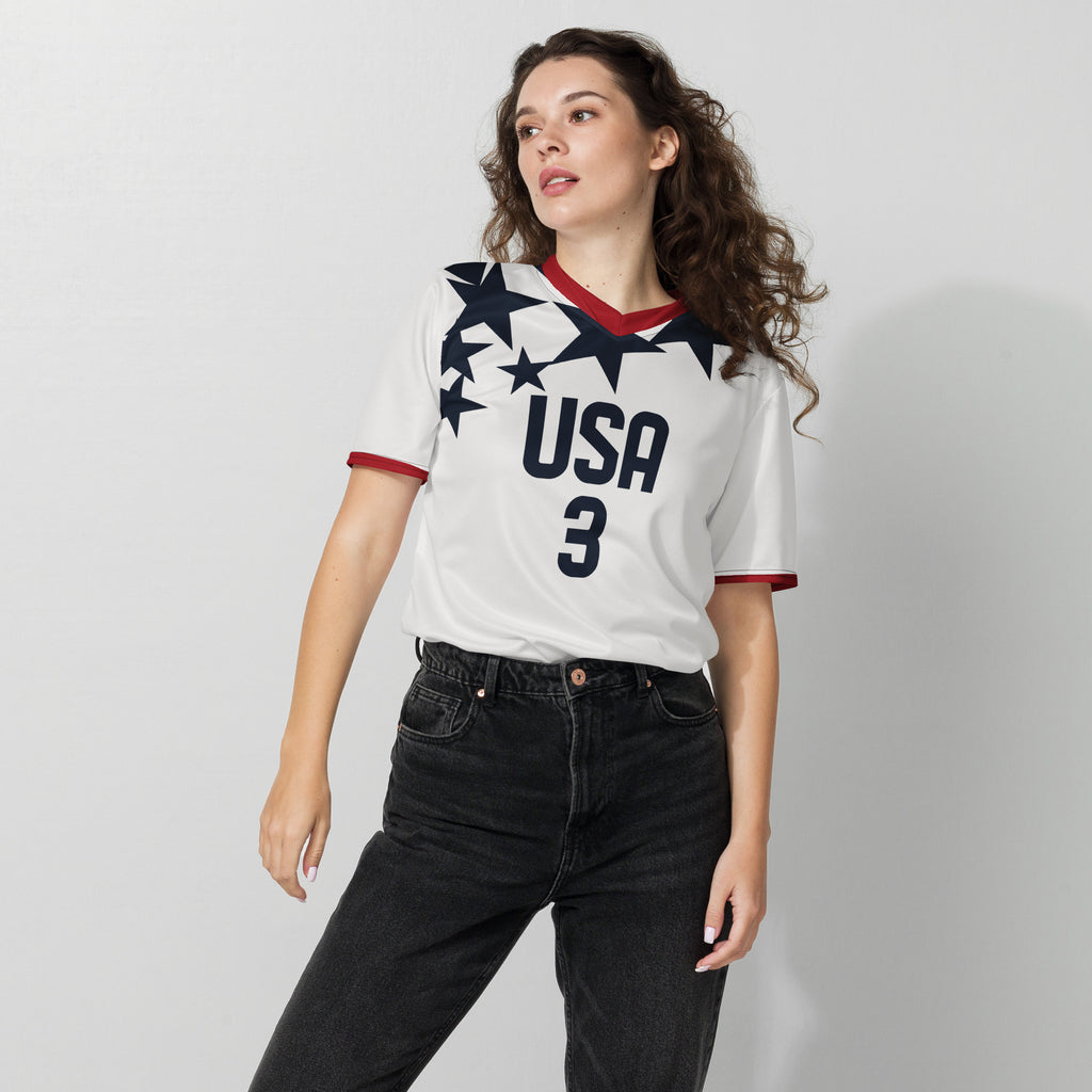 all-over-print-recycled-unisex-sports-jersey-3-USA-star-edition-soccer-jersey-_-navy-base-with-red-and-white-diagonal-strike-premium-national-team-fanwear-female-model-front-view