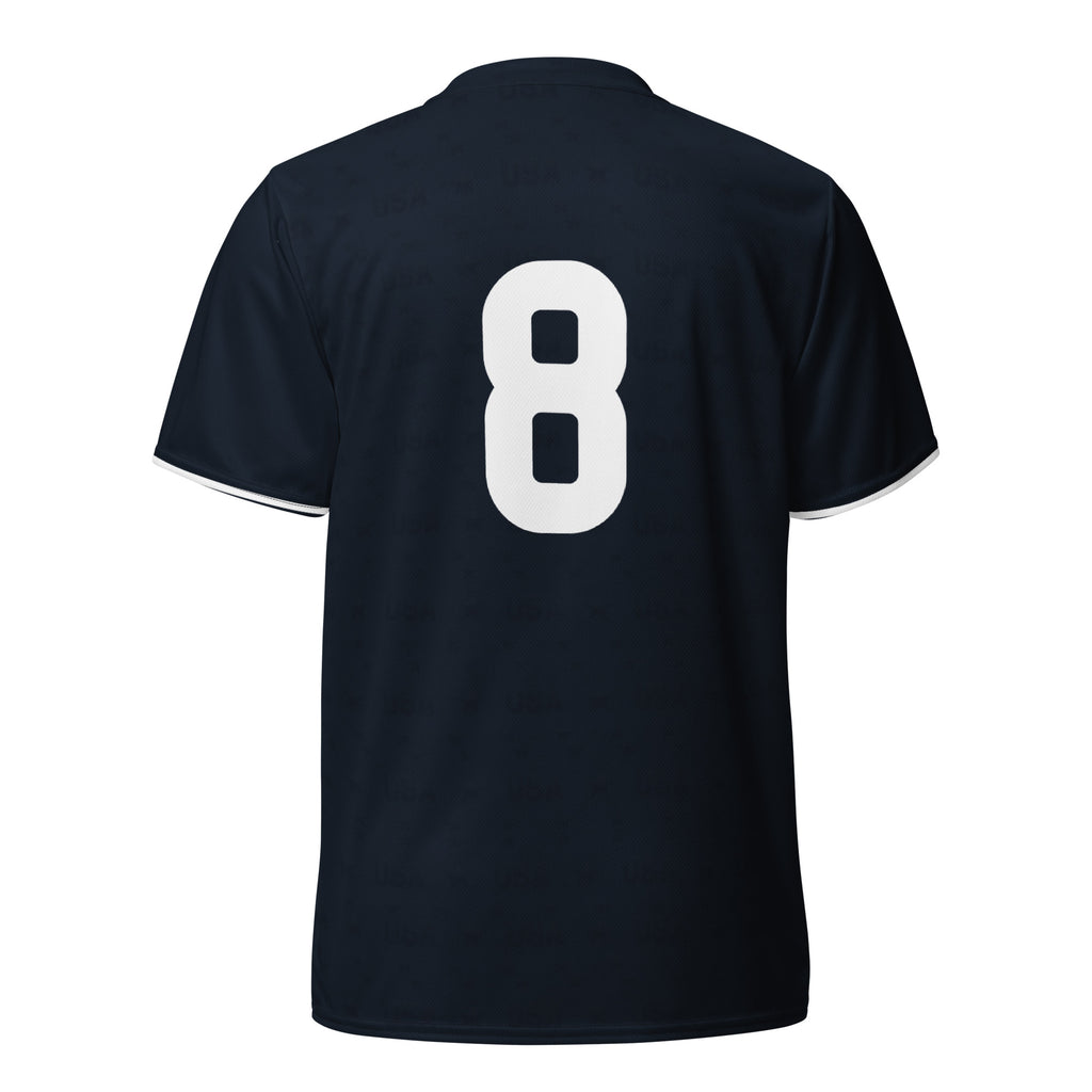 all-over-print-recycled-unisex-sports-jersey-USA-Midnight-Strike-soccer-jersey-navy-base-with-red-and-white-diagonal-strike-premium-national-team-fanwear-back-view
