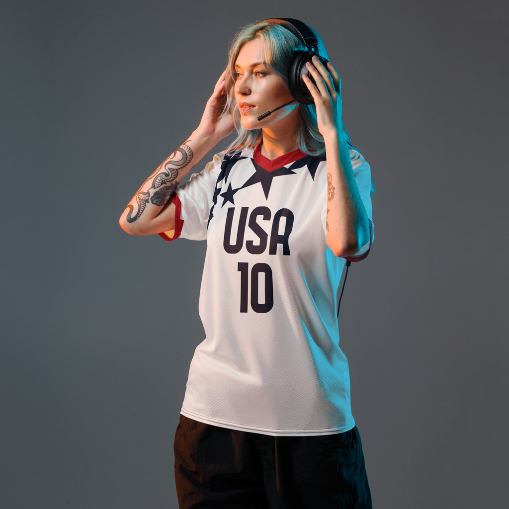 all-over-print-recycled-unisex-sports-jersey-USA-star-edition-soccer-jersey-_10-navy-base-with-red-and-white-diagonal-strike-premium-national-team-fanwear-front-female-model-view