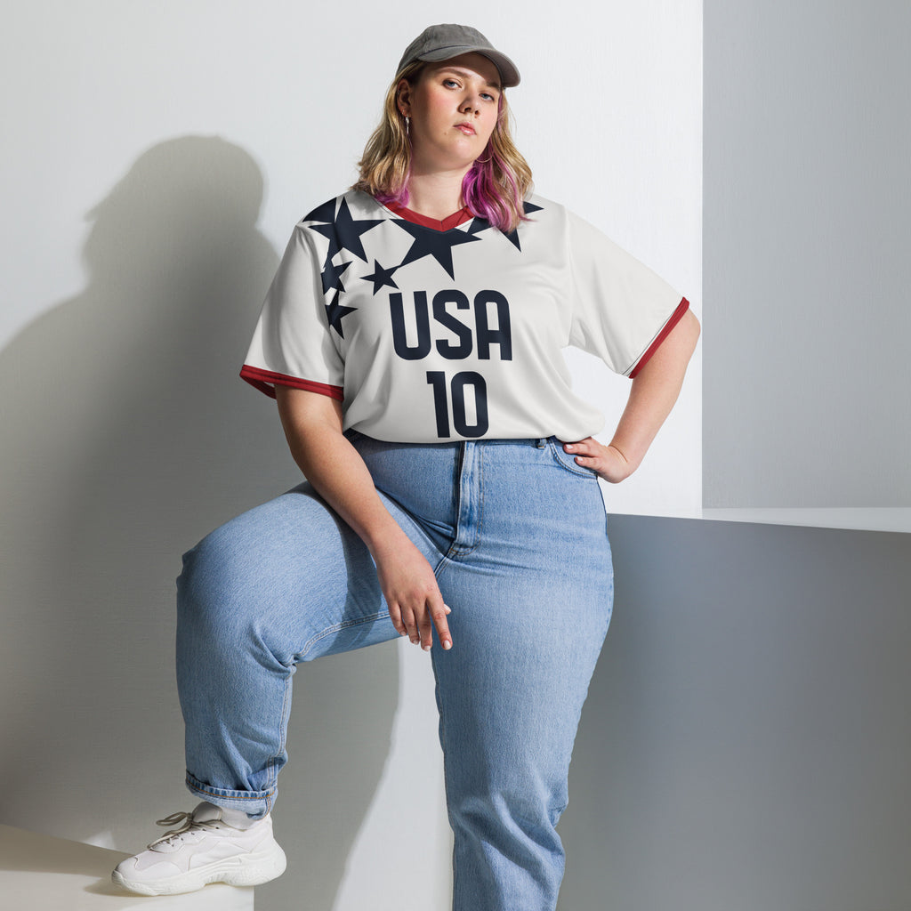 all-over-print-recycled-unisex-sports-jersey-USA-star-edition-soccer-jersey-_10-navy-base-with-red-and-white-diagonal-strike-premium-national-team-jersey_female-model