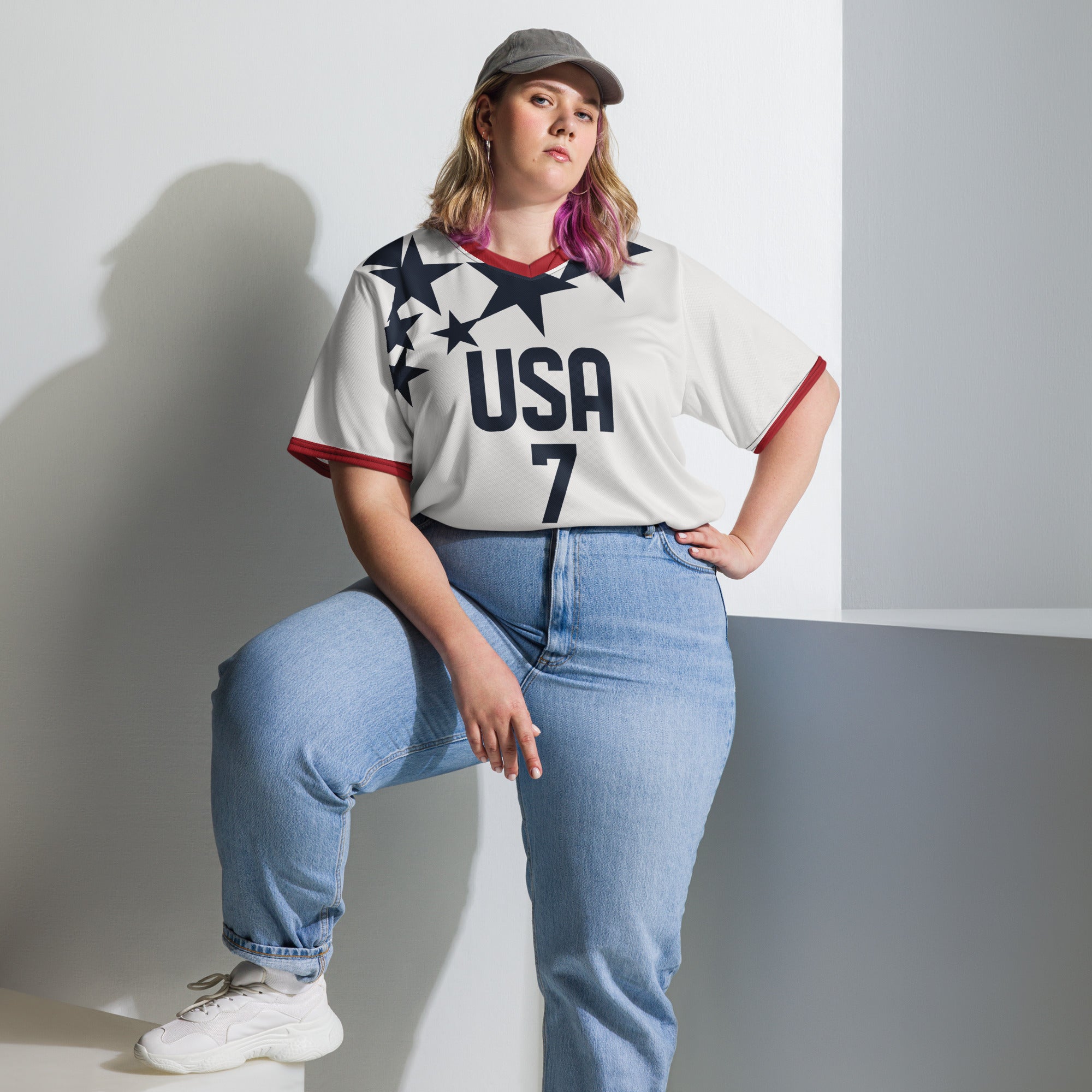 all-over-print-recycled-unisex-sports-jersey-USA-star-edition-soccer-jersey-_7-navy-base-with-red-and-white-diagonal-strike-premium-national-team-jersey_female-model
