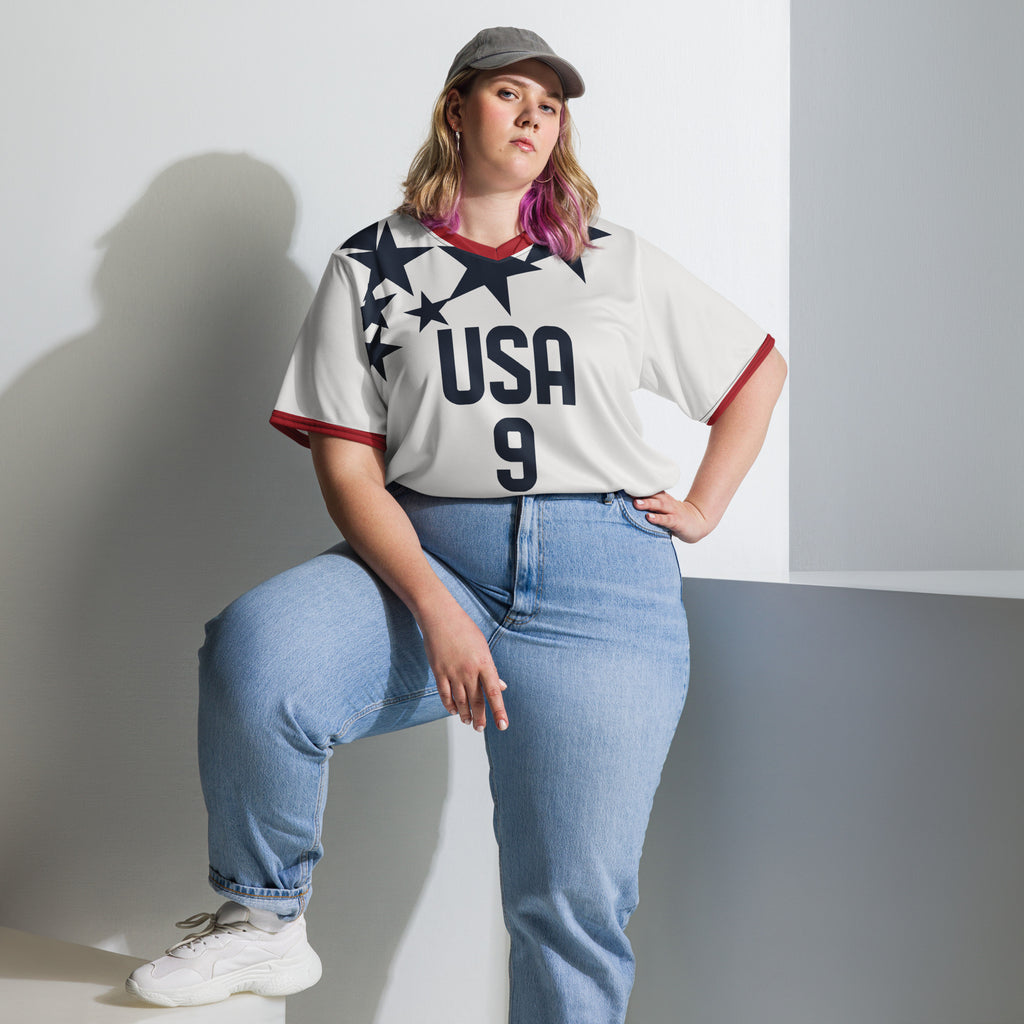 all-over-print-recycled-unisex-sports-jersey-USA-star-edition-soccer-jersey-_9-navy-base-with-red-and-white-diagonal-strike-premium-national-team-jersey_female-model