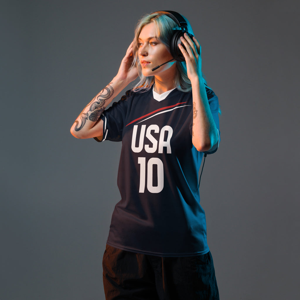 all-over-print-recycled-unisex-sports-jersey-_10-USA-Midnight-Strike-soccer-jersey-navy-base-with-red-and-white-diagonal-strike-premium-national-team-fanwear-front-female-model-view