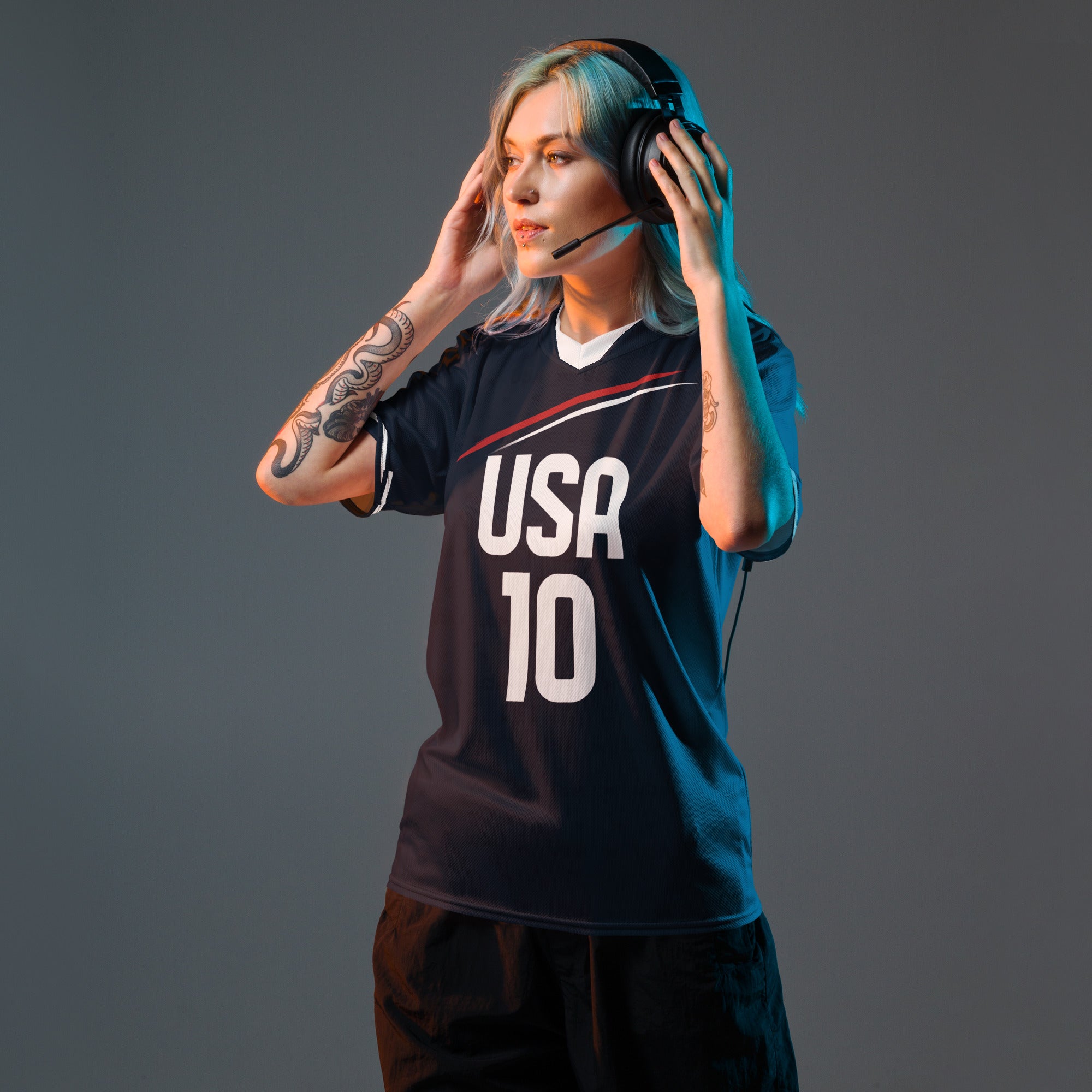 all-over-print-recycled-unisex-sports-jersey-_10-USA-Midnight-Strike-soccer-jersey-navy-base-with-red-and-white-diagonal-strike-premium-national-team-fanwear-front-female-model-view