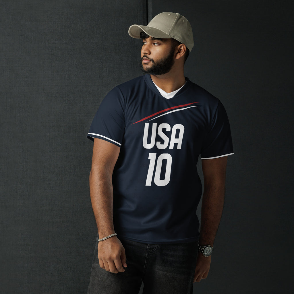 all-over-print-recycled-unisex-sports-jersey-_10-USA-Midnight-Strike-soccer-jersey-navy-base-with-red-and-white-diagonal-strike-premium-national-team-fanwear-male-model-front-view