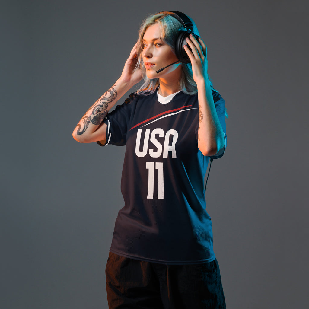 all-over-print-recycled-unisex-sports-jersey-_11-USA-Midnight-Strike-soccer-jersey-navy-base-with-red-and-white-diagonal-strike-premium-national-team-fanwear-front-female-model-view
