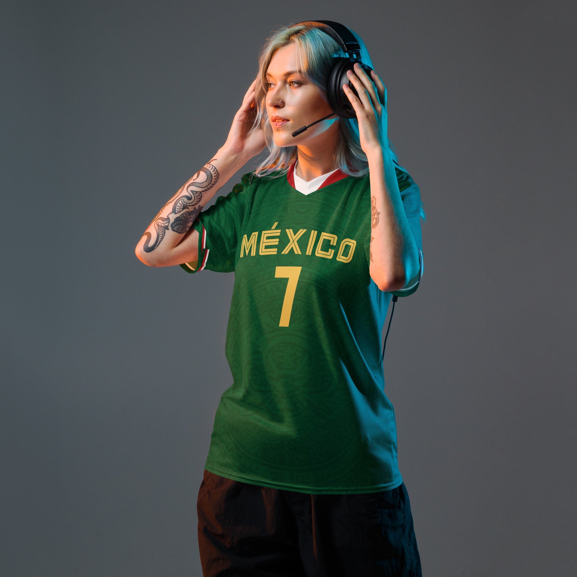 all-over-print-recycled-unisex-sports-jersey-_7-Mexico-Heritage-Verde-edition-soccer-jersey-_-navy-base-with-red-and-white-diagonal-strike-premium-national-team-fanwear-front-female-model-view