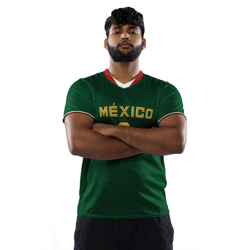 all-over-print-recycled-unisex-sports-jersey-_9-Mexico-Heritage-Verde-edition-soccer-jersey-_-navy-base-with-red-and-white-diagonal-strike-premium-national-team-fanwear-male-model-front-view