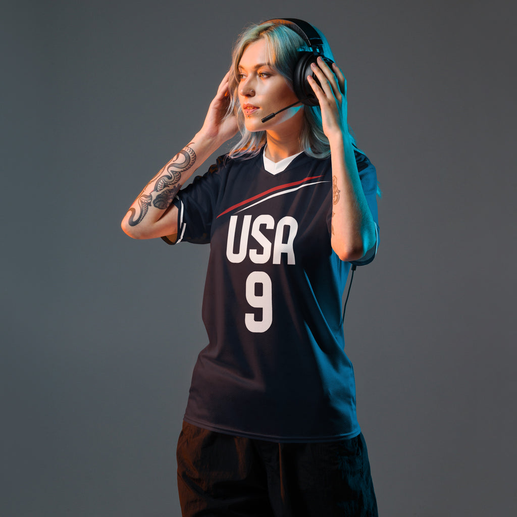 all-over-print-recycled-unisex-sports-jersey-_9-USA-Midnight-Strike-soccer-jersey-navy-base-with-red-and-white-diagonal-strike-premium-national-team-fanwear-front-female-model-view