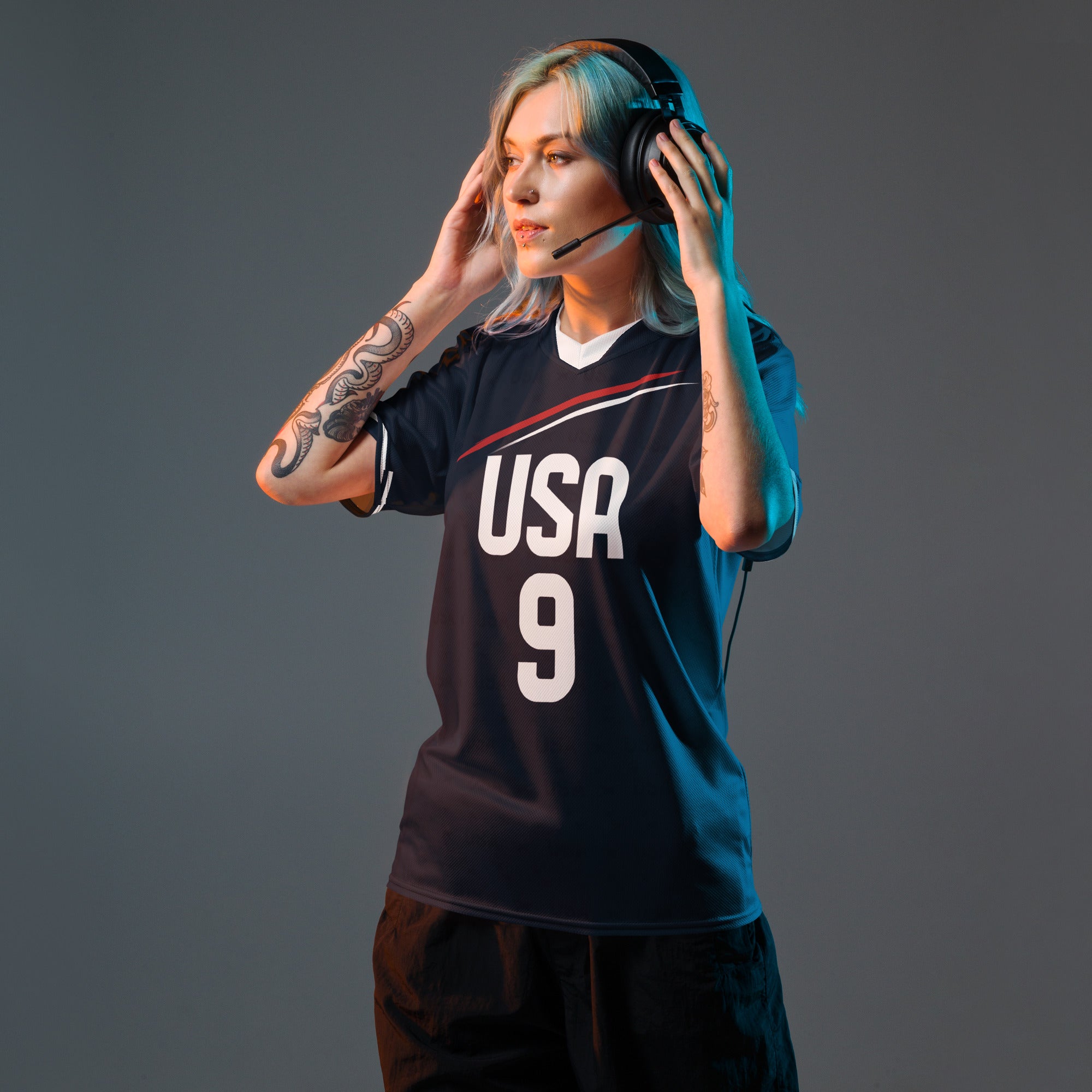 all-over-print-recycled-unisex-sports-jersey-_9-USA-Midnight-Strike-soccer-jersey-navy-base-with-red-and-white-diagonal-strike-premium-national-team-fanwear-front-female-model-view