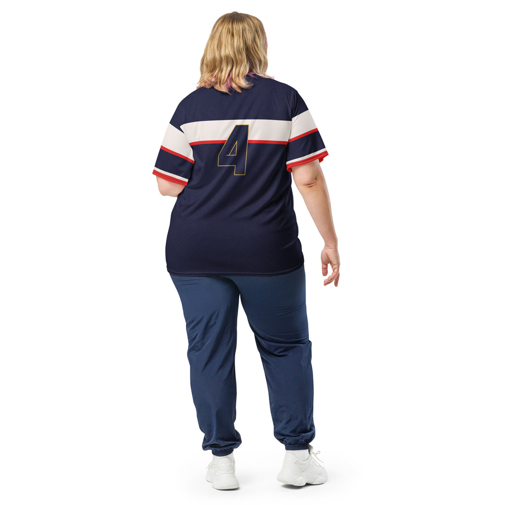 all-over-print-recycled-unisex-sports-jersey-France-Bleu-Majesté-edition-soccer-jersey-royal-blue-base-with-white-chest-band-and-gold-FRANCE-branding-premium-national-team-fanwear-model-back-view2-female-model