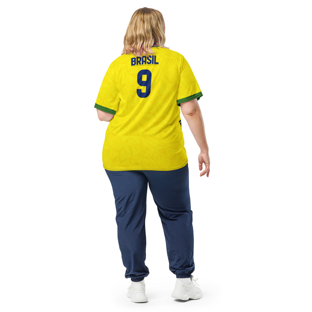 all-over-print-recycled-unisex-sports-jersey-#9-Brazil-Aurora-Amarela-edition-soccer-jersey-vibrant-yellow-with-blue-diagonal-strike-and-geometric-pattern-premium-national-team-fanwear-model-back-view2-female-model