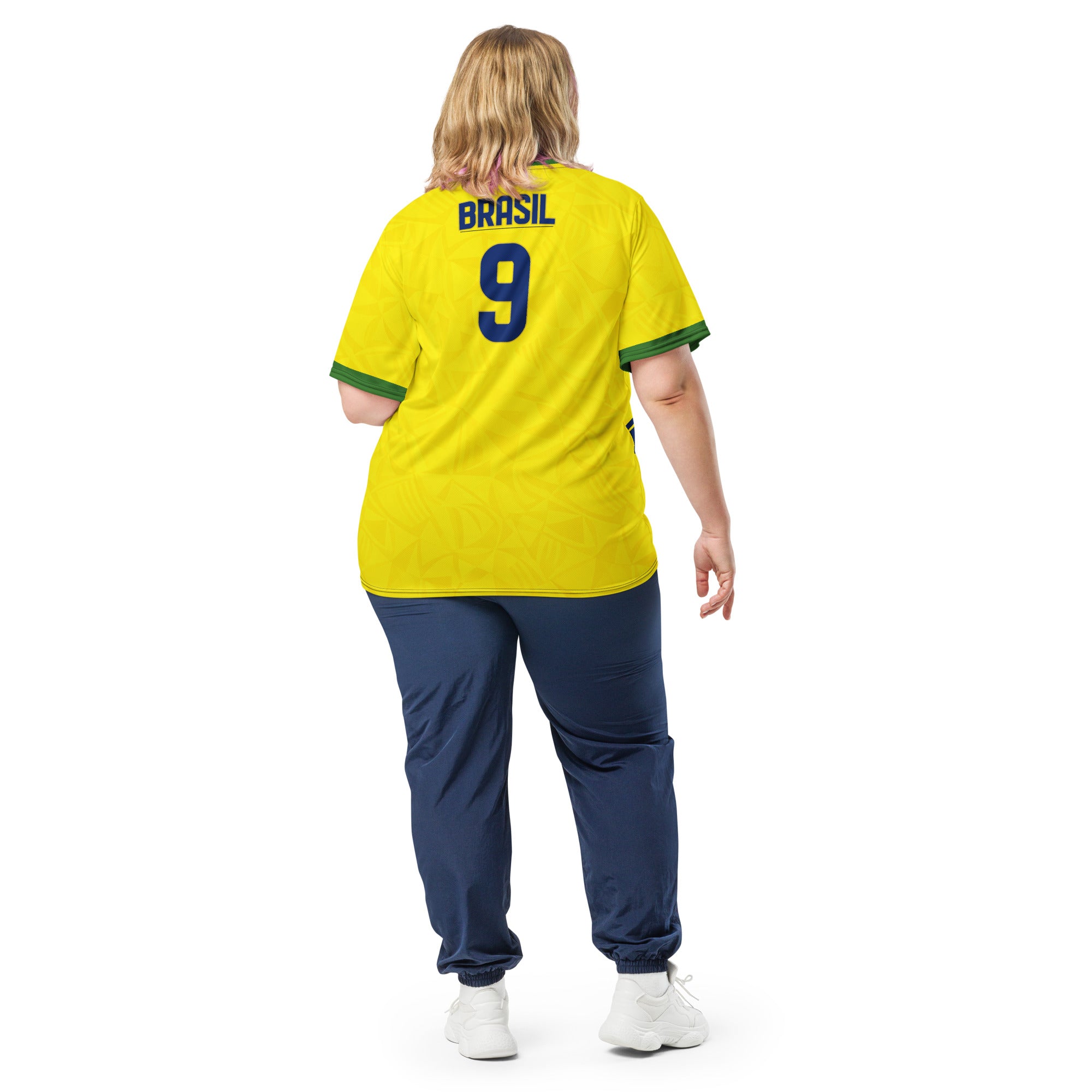 all-over-print-recycled-unisex-sports-jersey-#9-Brazil-Aurora-Amarela-edition-soccer-jersey-vibrant-yellow-with-blue-diagonal-strike-and-geometric-pattern-premium-national-team-fanwear-model-back-view2-female-model