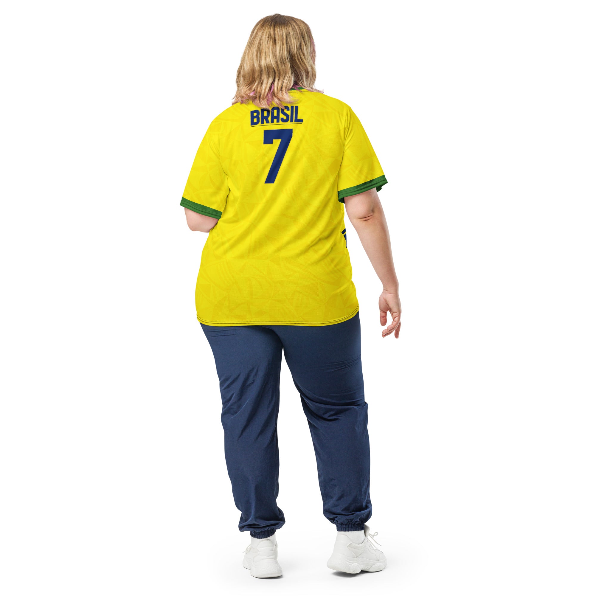 all-over-print-recycled-unisex-sports-jersey-#7-Brazil-Aurora-Amarela-edition-soccer-jersey-vibrant-yellow-with-blue-diagonal-strike-and-geometric-pattern-premium-national-team-fanwear-model-back-view2-female-model