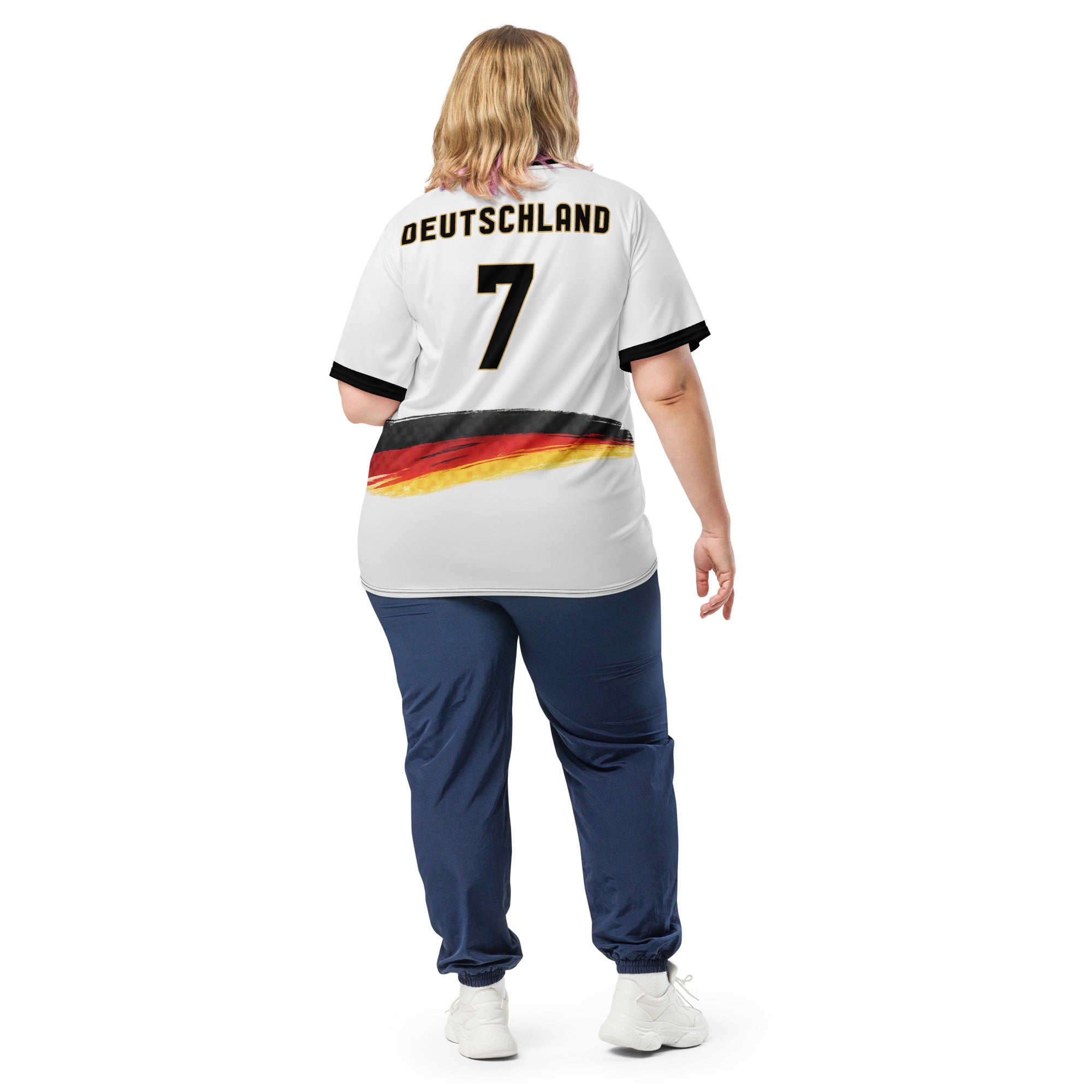 all-over-print-recycled-unisex-sports-jersey-Germany Horizon-edition-soccer-jersey-black-sleeves-with-tricolor-brushstroke-band-and-gold red black-trim-pattern-premium-national-team-fanwear-model-back-view2-female-model
