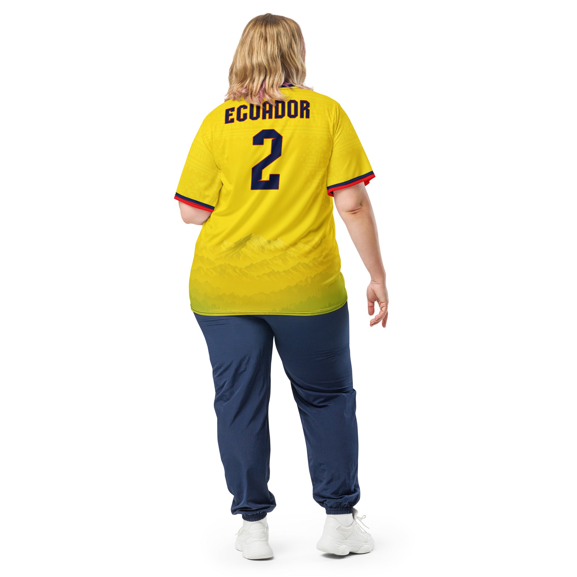 all-over-print-recycled-unisex-sports-jersey-Ecuador-Condor-soccer-jersey-yellow-base-with-mountain-silhouette-and-navy red-accents-premium-national-team-fanwear-model-back-view2-female-model