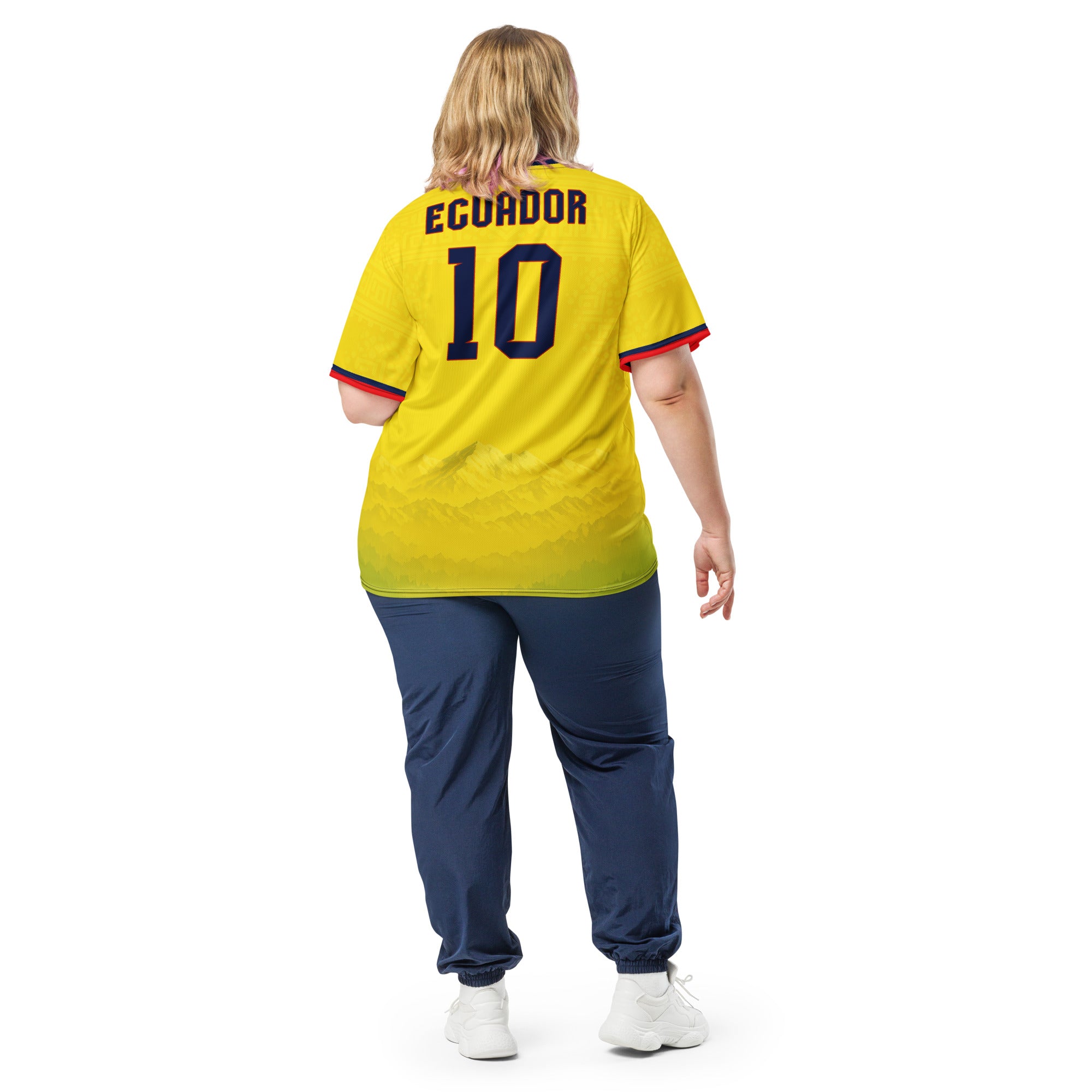 all-over-print-recycled-unisex-sports-jersey-Ecuador-Condor-soccer-jersey-yellow-base-with-mountain-silhouette-and-navy red-accents-premium-national-team-fanwear-model-back-view2-female-model