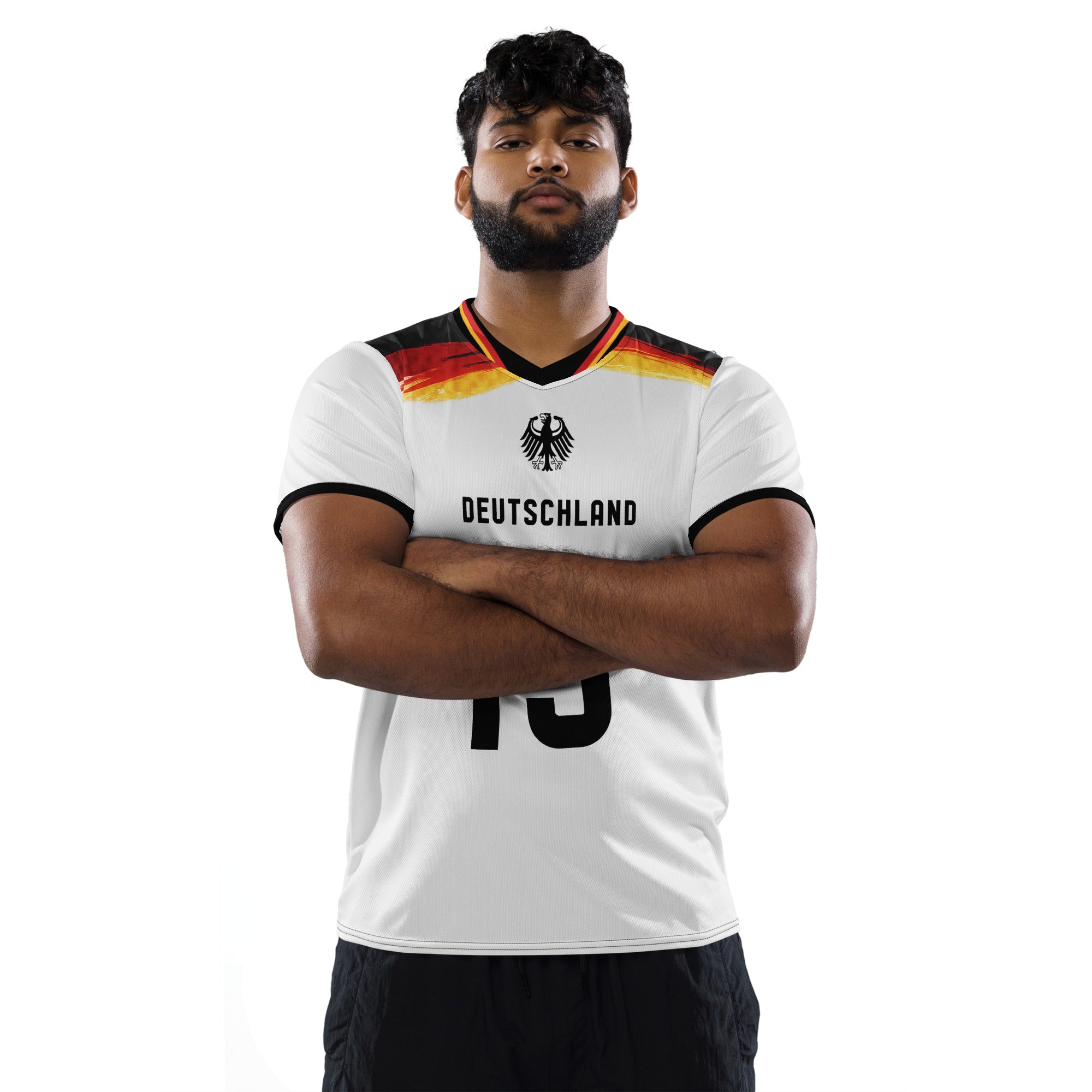 all-over-print-recycled-unisex-sports-jersey-Germany Horizon-edition-soccer-jersey-black-sleeves-with-tricolor-brushstroke-band-and-gold red black-trim-pattern-premium-national-team-fanwear-male-model-front-view