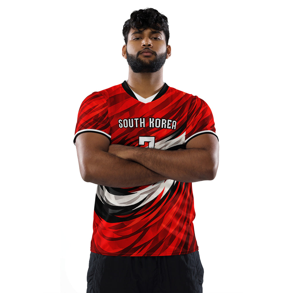 all-over-print-recycled-unisex-sports-jersey-South-Korea-Taegeuk-soccer-jersey- crimson-base-with-sweeping-red black white-wave-design-premium-national-team-fanwear-male-model-front-view