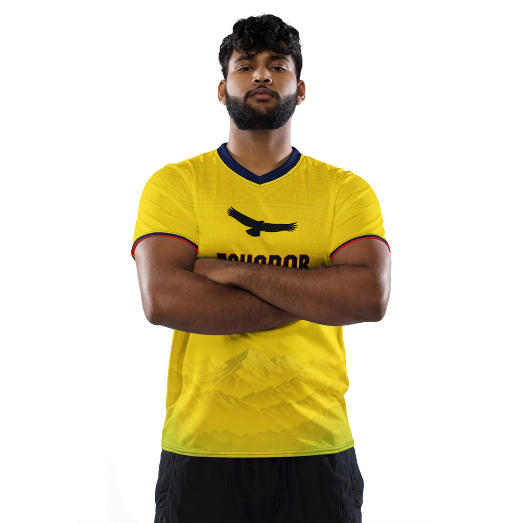 all-over-print-recycled-unisex-sports-jersey-Ecuador-Condor-soccer-jersey-yellow-base-with-mountain-silhouette-and-navy red-accents-premium-national-team-fanwear-male-model-front-view