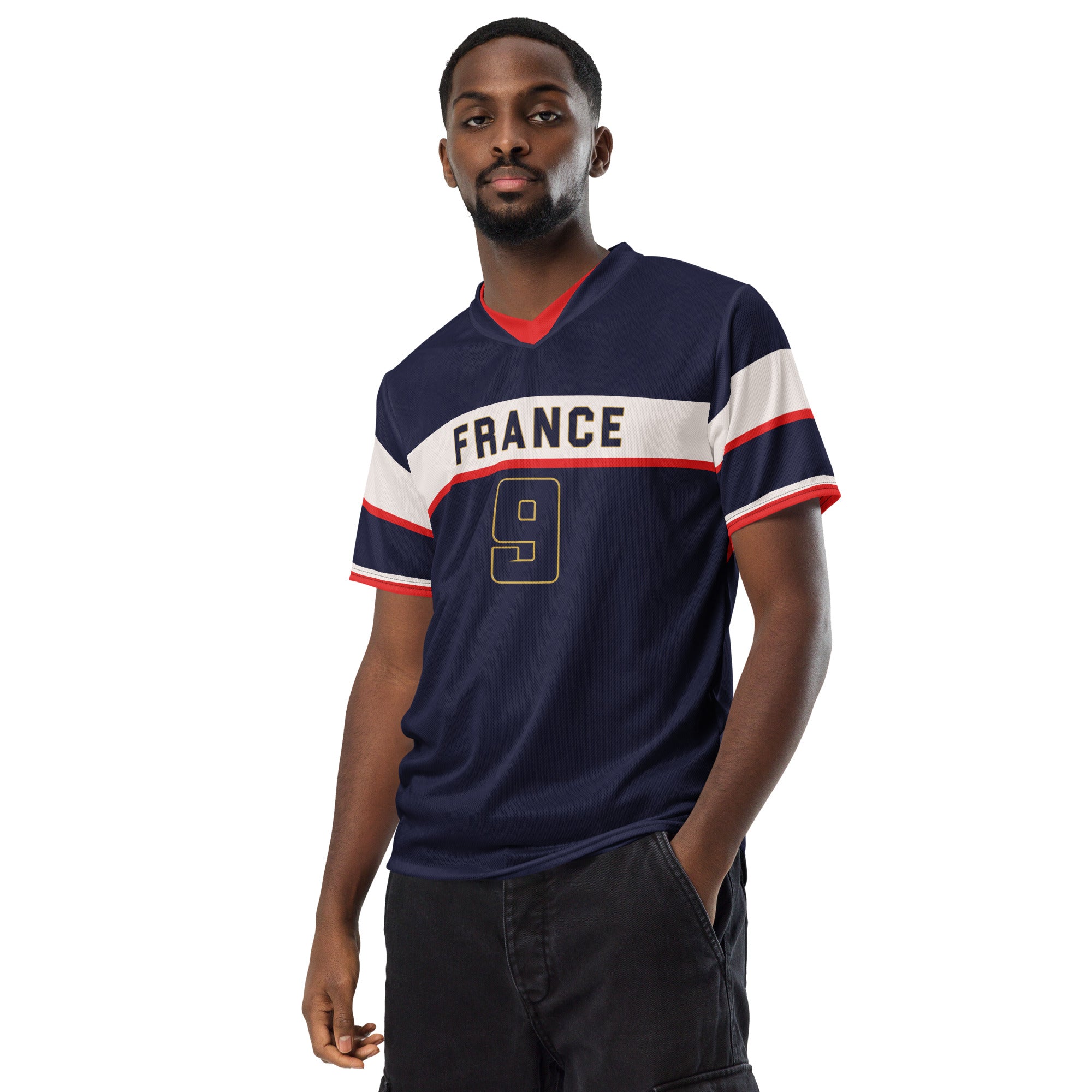 all-over-print-recycled-unisex-sports-jersey-France-Bleu-Majesté-edition-soccer-jersey-royal-blue-base-with-white-chest-band-and-gold-FRANCE-branding-premium-national-team-fanwear-model-front-view-male-model