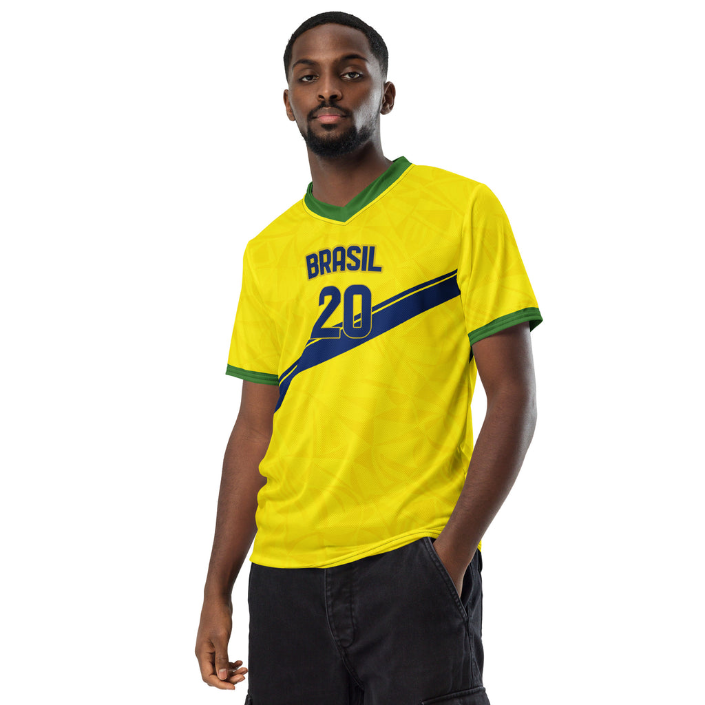 all-over-print-recycled-unisex-sports-jersey-#20- Brazil-Aurora-Amarela-edition-soccer-jersey-vibrant-yellow-with-blue-diagonal-strike-and-geometric-pattern-premium-national-team-fanwear-model-front-view-male-model