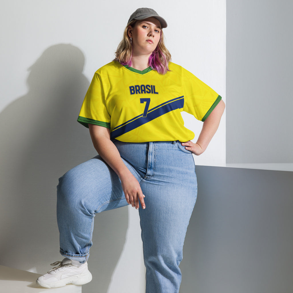 all-over-print-recycled-unisex-sports-jersey-#7-Brazil-Aurora-Amarela-edition-soccer-jersey-vibrant-yellow-with-blue-diagonal-strike-and-geometric-pattern-premium-national-team-fanwear-model-front-view2-female