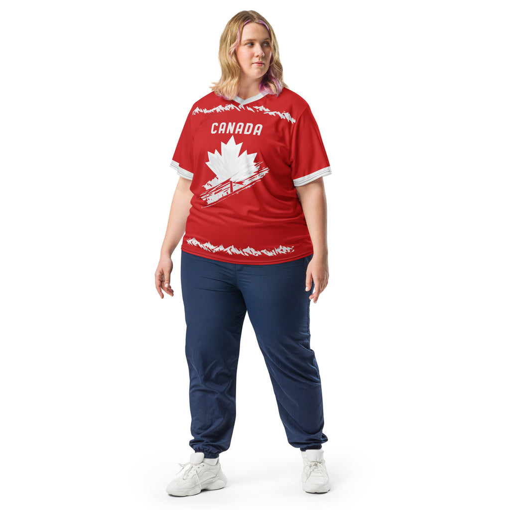 all-over-print-recycled-unisex-sports-jersey-#19-Canada-Northern-Pulse-edition-soccer-jersey-#-red-base-with- with-maple-leaf-and-mountain-graphics-premium-national-team-fanwear-model-front-view-female-model