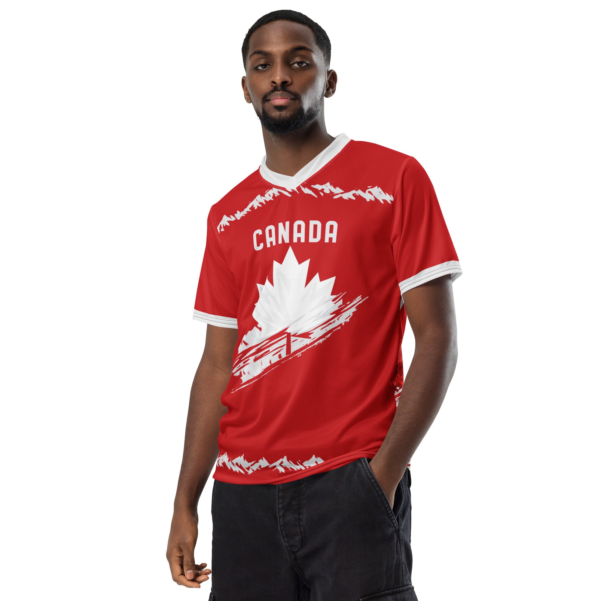 all-over-print-recycled-unisex-sports-jersey-#10-Canada-Northern-Pulse-edition-soccer-jersey-#-red-base-with- with-maple-leaf-and-mountain-graphics-premium-national-team-fanwear-model-front-view-male-model