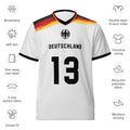 all-over-print-recycled-unisex-sports-jersey-Germany Horizon-edition-soccer-jersey-black-sleeves-with-tricolor-brushstroke-band-and-gold red black-trim-pattern-premium-national-team-fanwear-front-view