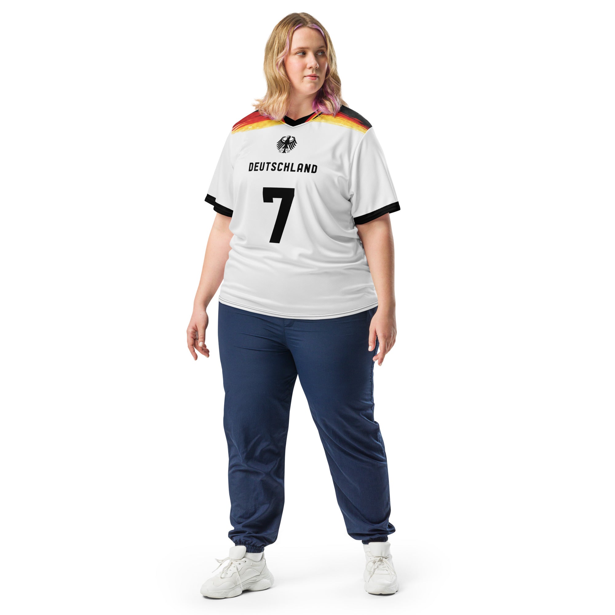 all-over-print-recycled-unisex-sports-jersey-Germany Horizon-edition-soccer-jersey-black-sleeves-with-tricolor-brushstroke-band-and-gold red black-trim-pattern-premium-national-team-fanwear-model-front-view2-female-model