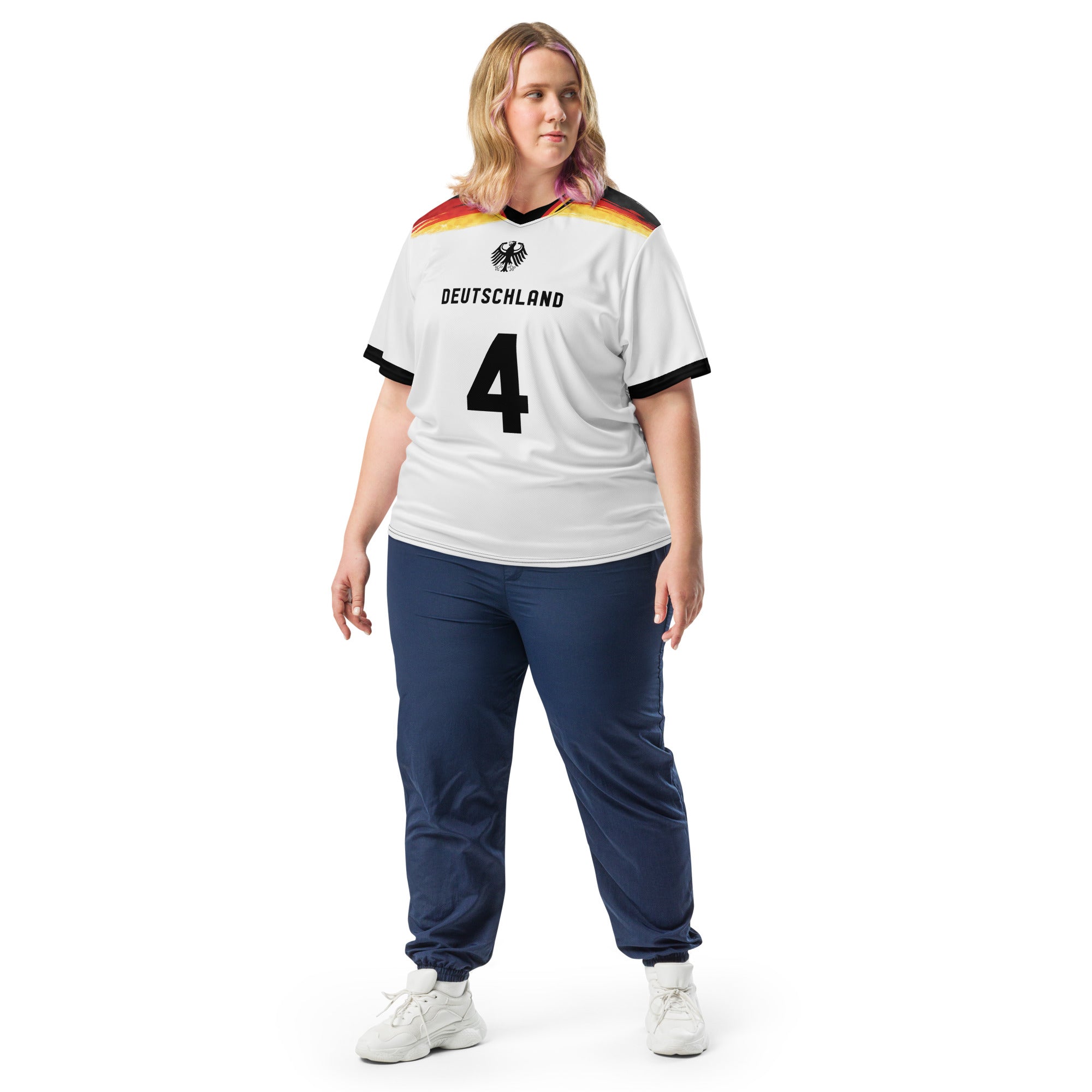 all-over-print-recycled-unisex-sports-jersey-Germany Horizon-edition-soccer-jersey-black-sleeves-with-tricolor-brushstroke-band-and-gold red black-trim-pattern-premium-national-team-fanwear-model-front-view2-female-model