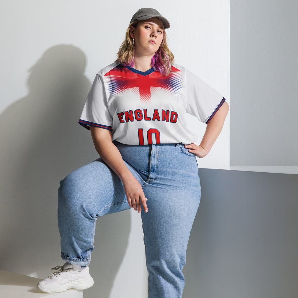 all-over-print-recycled-unisex-sports-jersey-#10-England-Lionheart-edition-soccer-jersey-vibrant-yellow-with-blue-diagonal-strike-and-geometric-pattern-premium-national-team-fanwear-model-front-view2-female