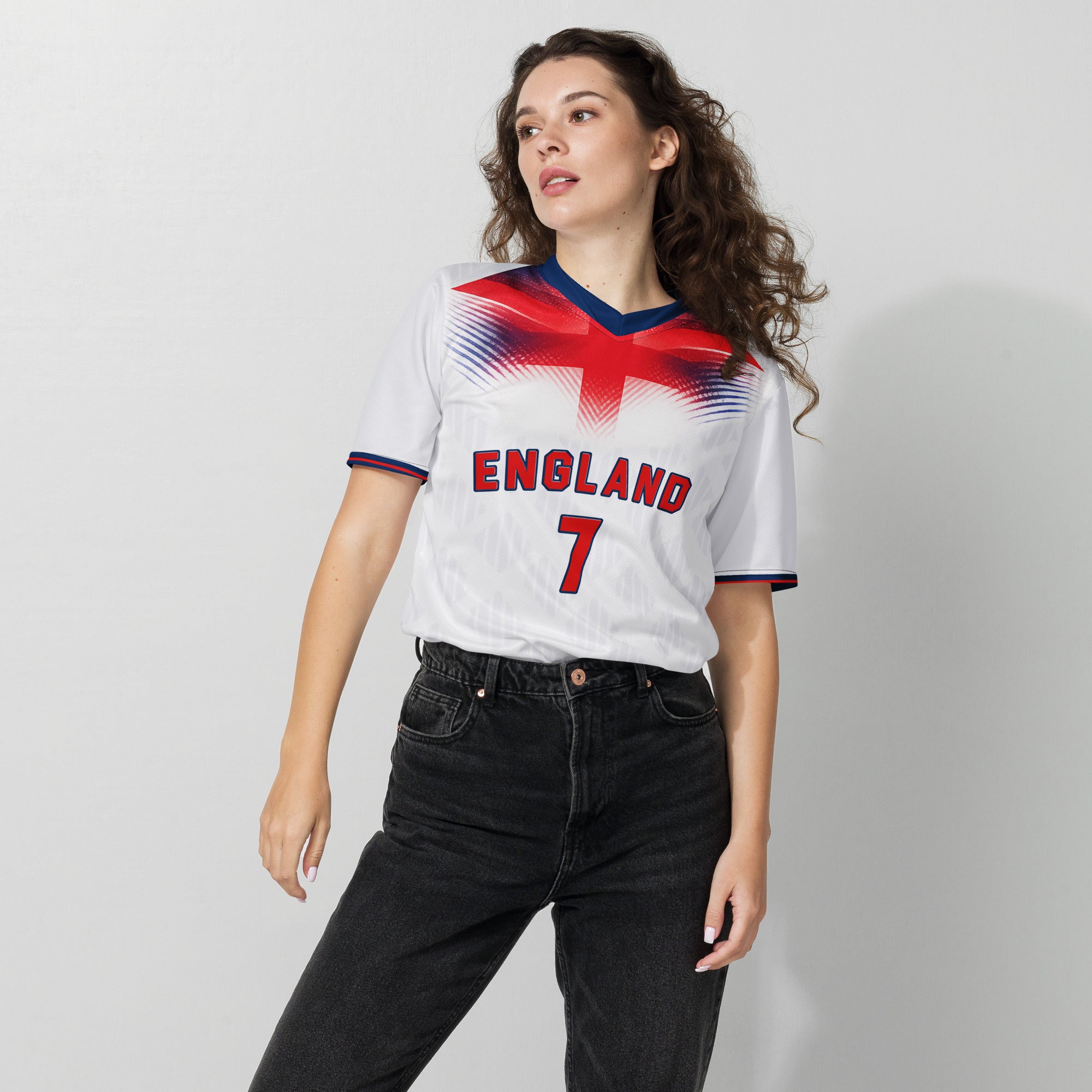 all-over-print-recycled-unisex-sports-jersey-#7-England-Lionheart-edition-soccer-jersey-vibrant-yellow-with-blue-diagonal-strike-and-geometric-pattern -premium-national-team-fanwear-female-model-front-view