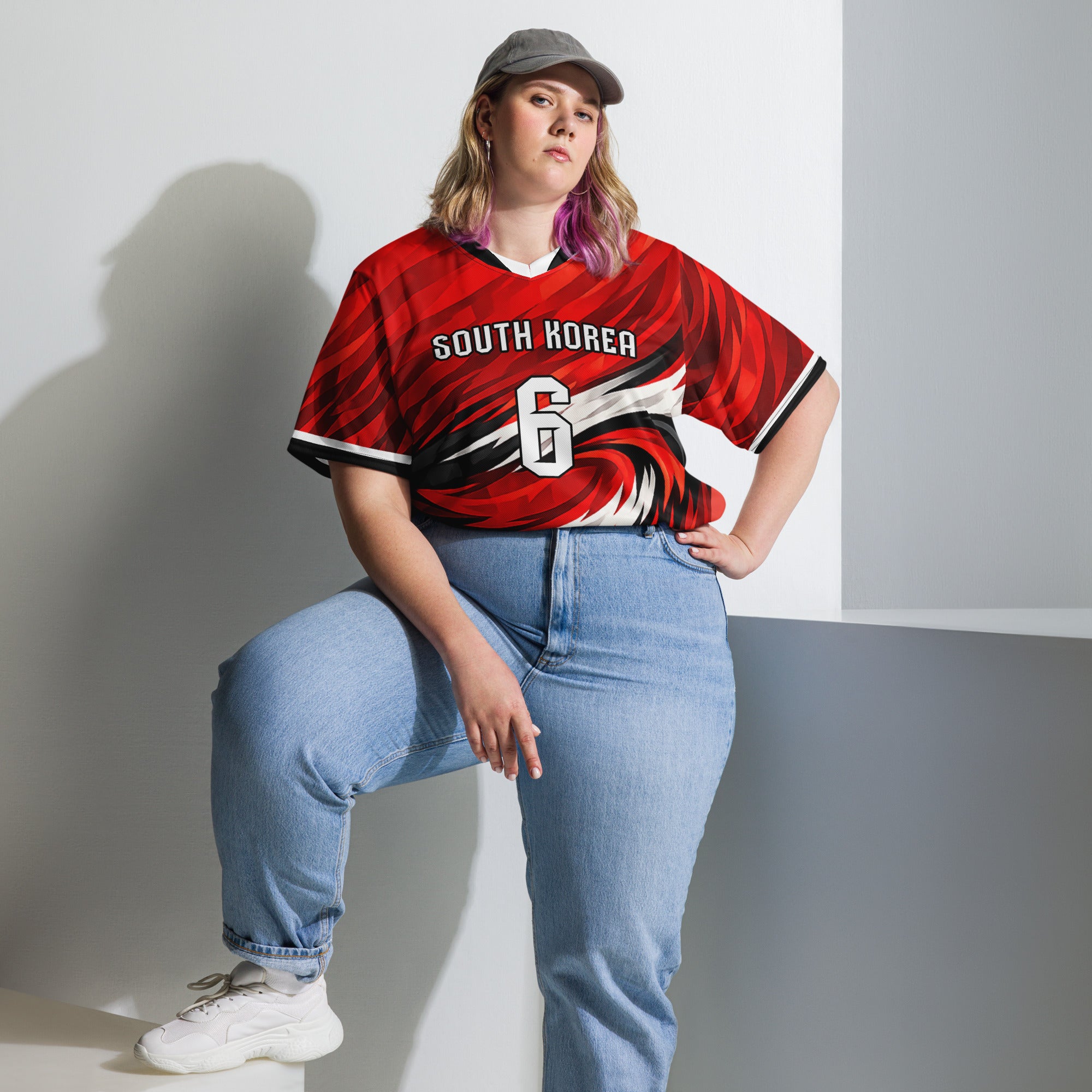 all-over-print-recycled-unisex-sports-jersey-South-Korea-Taegeuk-soccer-jersey- crimson-base-with-sweeping-red black white-wave-design-premium-national-team-fanwear-model-front-view2-female