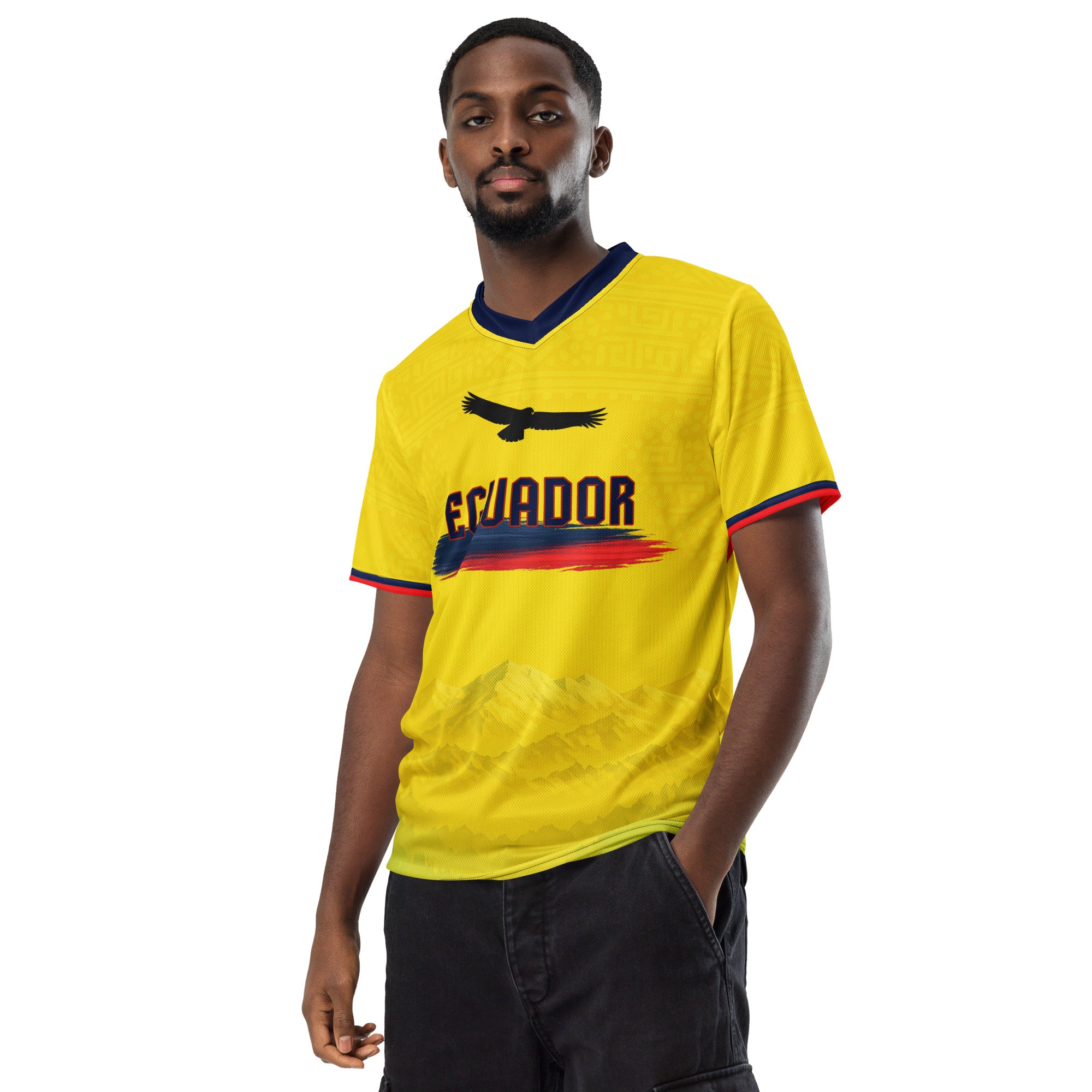 all-over-print-recycled-unisex-sports-jersey-Ecuador-Condor-soccer-jersey-yellow-base-with-mountain-silhouette-and-navy red-accents-premium-national-team-fanwear-model-front-view-male-model