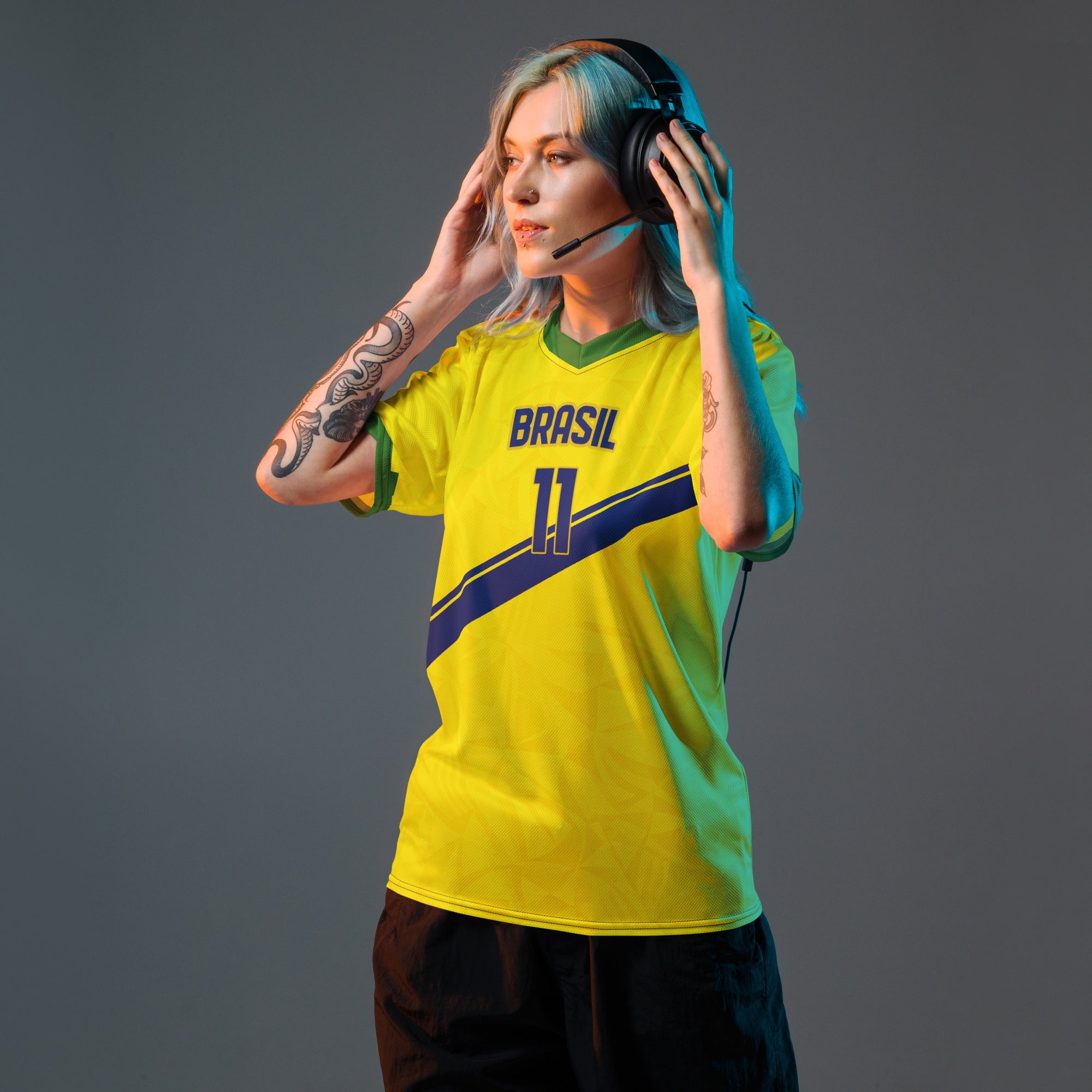 all-over-print-recycled-unisex-sports-jersey-#11- Brazil-Aurora-Amarela-edition-soccer-jersey-vibrant-yellow-with-blue-diagonal-strike-and-geometric-pattern-premium-national-team-fanwear-model-front-view-female-model