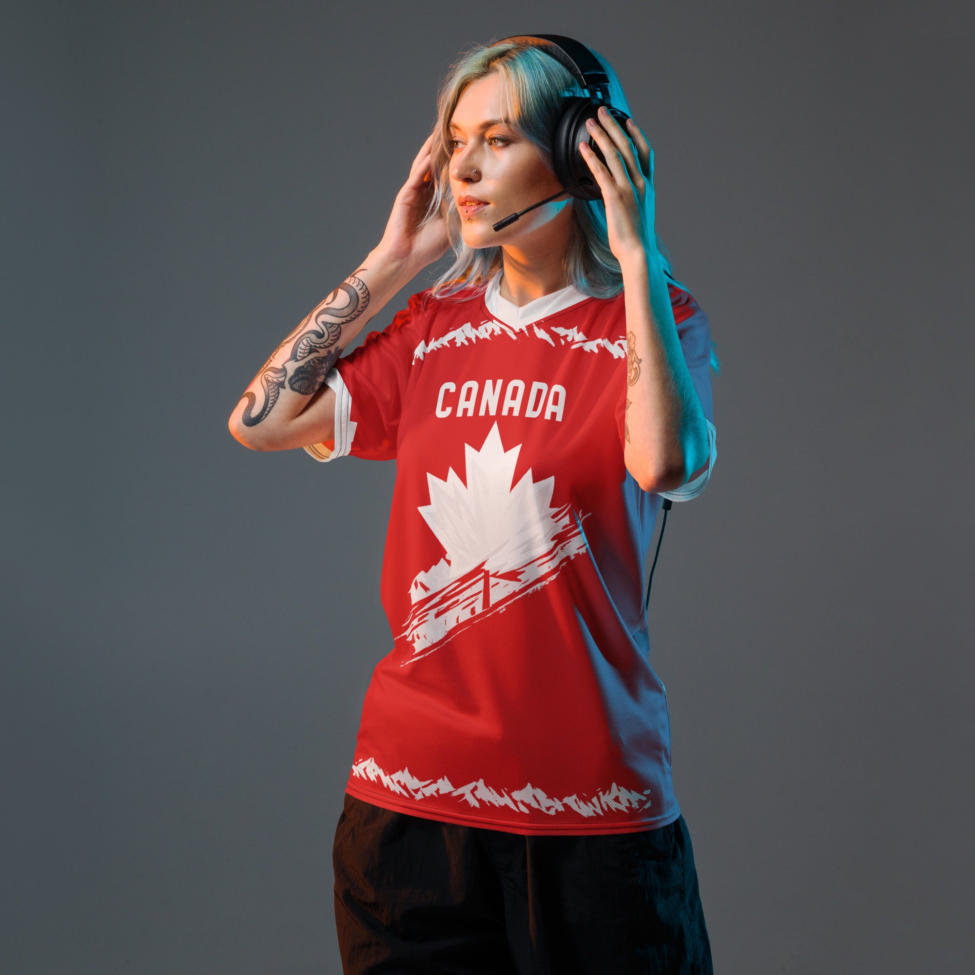 all-over-print-recycled-unisex-sports-jersey-#19-Canada-Northern-Pulse-edition-soccer-jersey-#-red-base-with- with-maple-leaf-and-mountain-graphics-premium-national-team-fanwear-model-front-view-male-model