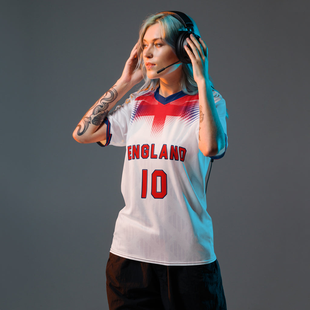all-over-print-recycled-unisex-sports-jersey-#10-England-Lionheart-edition-soccer-jersey-vibrant-yellow-with-blue-diagonal-strike-and-geometric-pattern-premium-national-team-fanwear-model-front-view-female-model