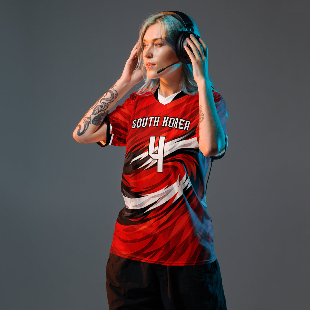 all-over-print-recycled-unisex-sports-jersey-South-Korea-Taegeuk-soccer-jersey- crimson-base-with-sweeping-red black white-wave-design-premium-national-team-fanwear-model-front-view-female-model
