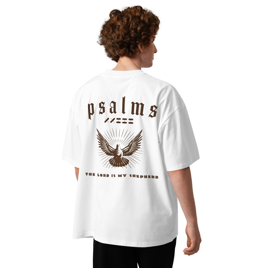 Male model wearing Oerigin's white oversized heavyweight streetwear "psalms 23" t-shirt on the back. 